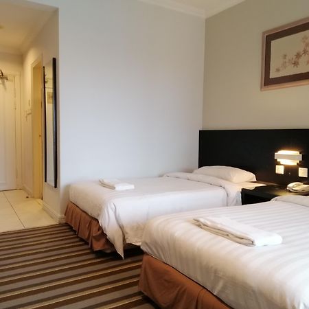 Stayinn Gateway Hotel Apartment Kuching Esterno foto