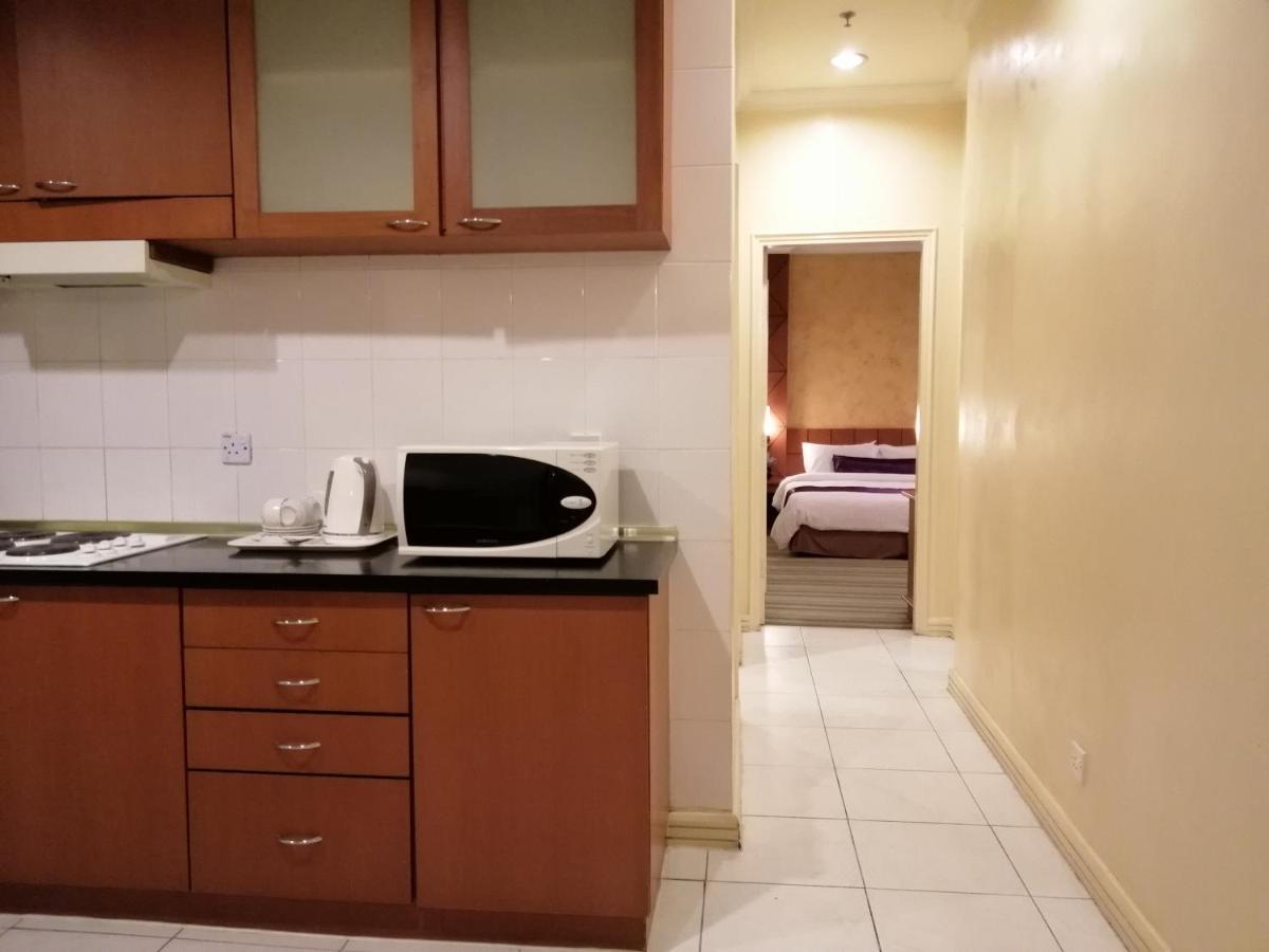 Stayinn Gateway Hotel Apartment Kuching Esterno foto