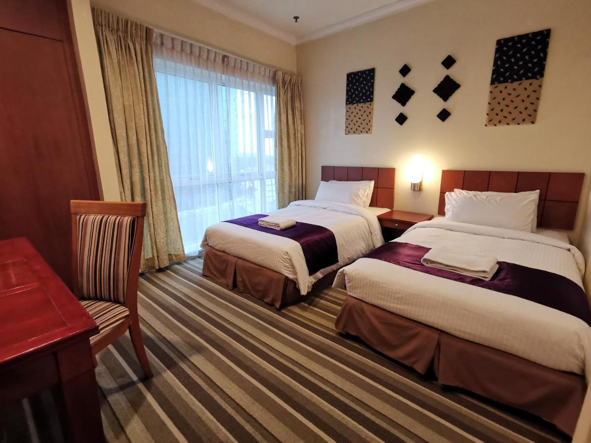 Stayinn Gateway Hotel Apartment Kuching Esterno foto