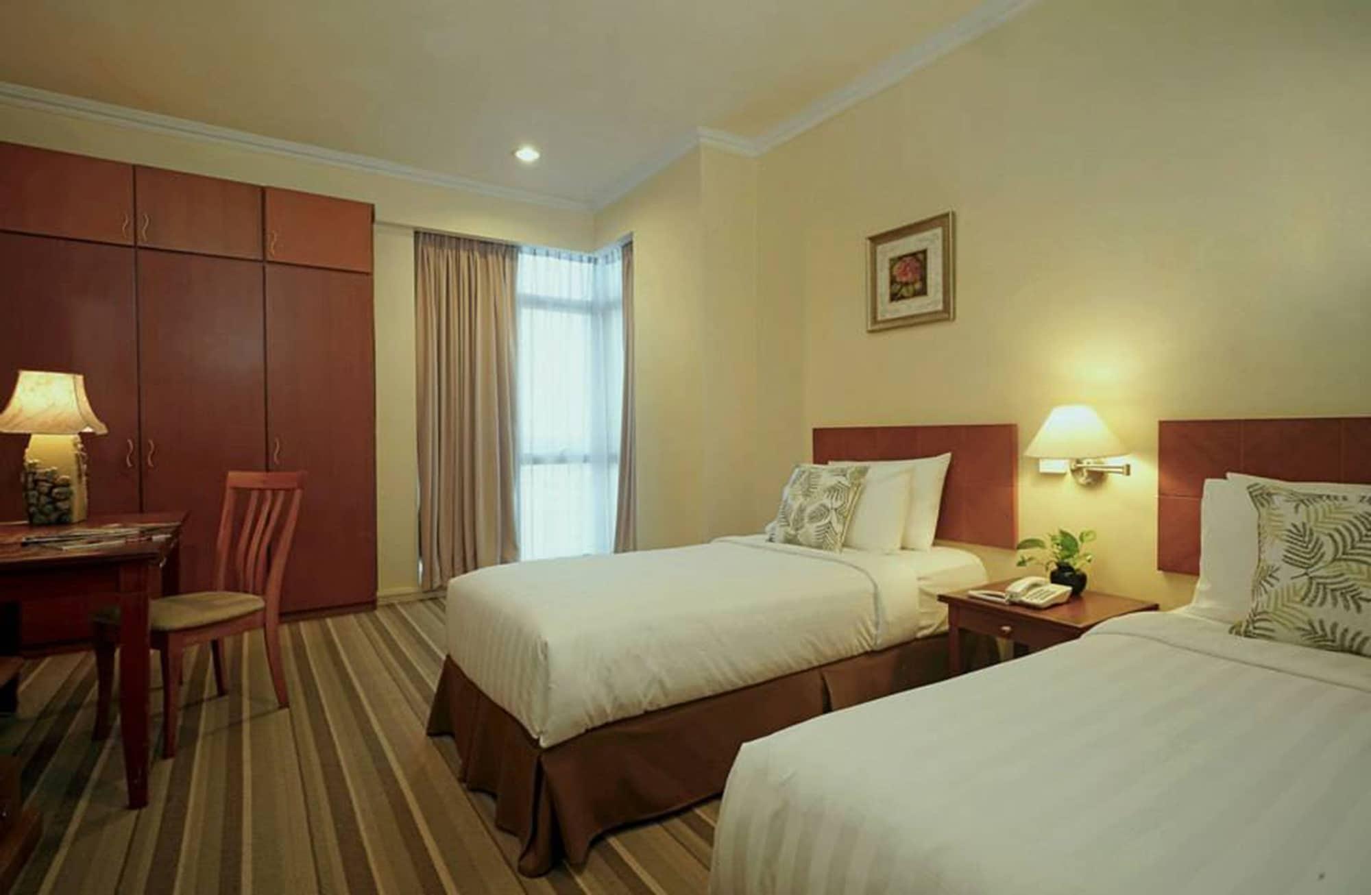 Stayinn Gateway Hotel Apartment Kuching Esterno foto