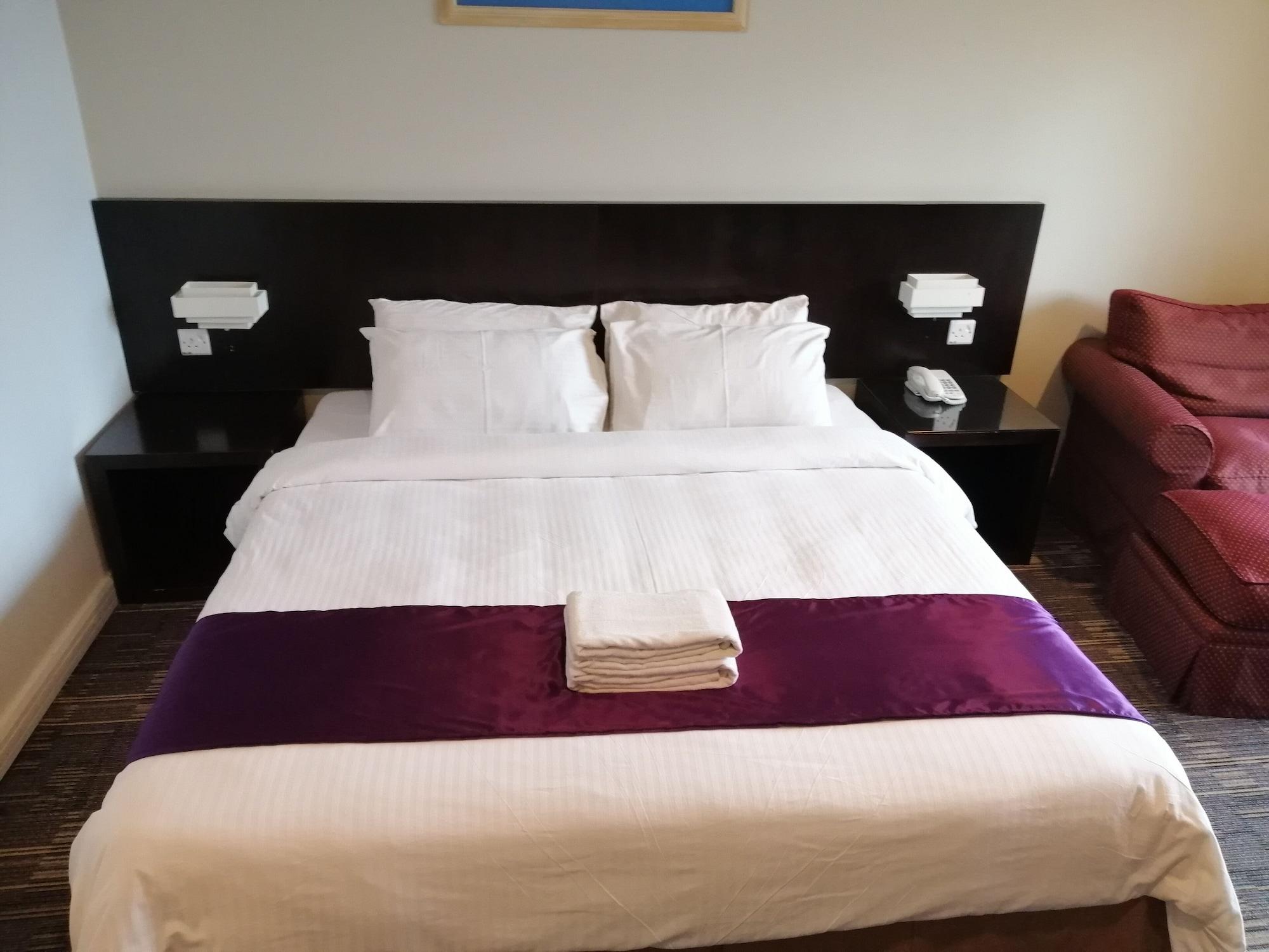 Stayinn Gateway Hotel Apartment Kuching Esterno foto